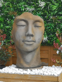 Statue de jardin en pierre - visage homme